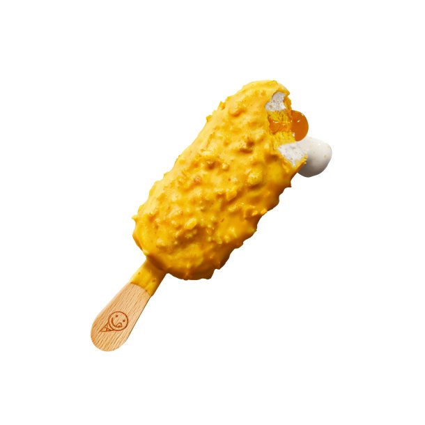 Ispind med cremet mangois, mangofyld, overtr�k med mangosmag samt spr�de stykker af kokos og knasende kiks.
