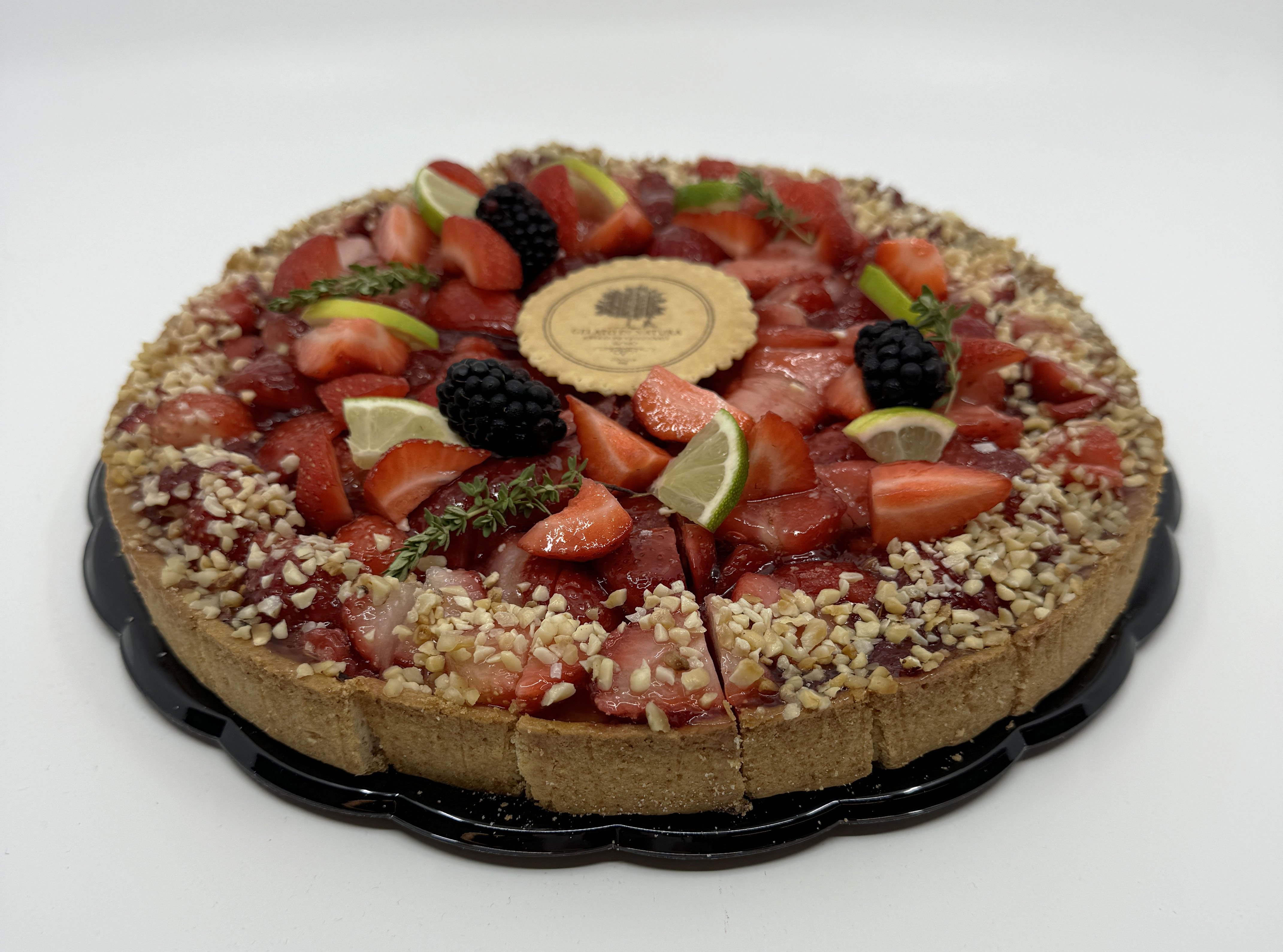 Jordbrtrte med sprd bund, vaniljecreme og friske jordbr i blank brgele – fra Gelato di Natura.